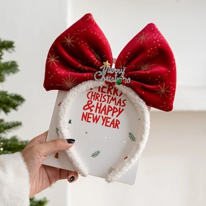 Red velvet Christmas reindeer headband with gold stars bow and Merry Christmas ornament