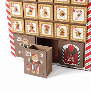 Close-up of wooden Christmas advent calendar with 24 gingerbread house drawers