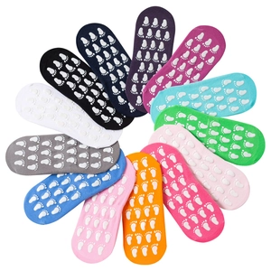 Non-slip trampoline and yoga socks with grip dots in multiple vibrant colors