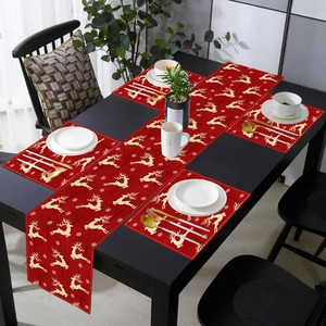 Christmas table runner and placemats set with golden reindeer and snowflake motifs
