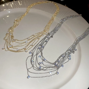 Elegant multi-layered zircon fringe necklace with gold and silver bead chain details