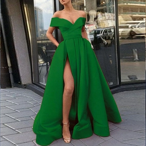 Elegant dark green off-shoulder satin evening gown with high slit and slim fit silhouette