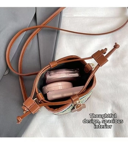 Internal view of girls plaid bucket bag showing spacious storage for cosmetics