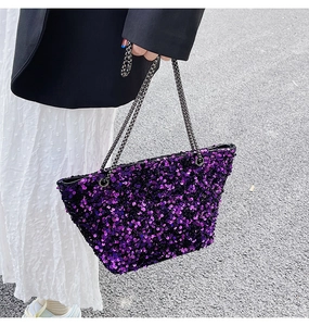 Detail shot of the sequin tote bag featuring shimmering purple and black paillettes