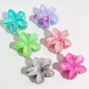 Set of 6 colorful floral hair claws with marble ink texture in diverse elegant shades
