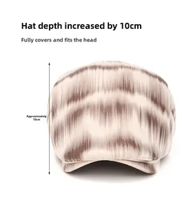 Close-up of vintage brown tie-dye newsboy cap with 10cm depth measurement detail