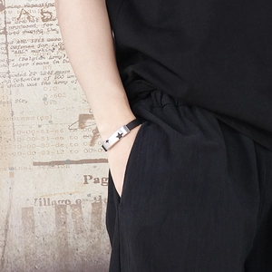 Men's black leather punk bracelet with star-engraved stainless steel curved metal plate