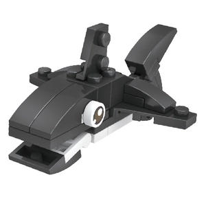 Macro detail of a small black and white shark building block toy with articulated fins