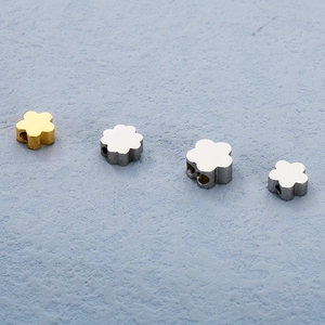 Stainless steel flower beads in gold and silver finish for DIY jewelry making