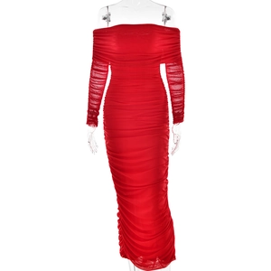 Detail of red off-shoulder mesh long sleeve ruched bodycon dress on a mannequin