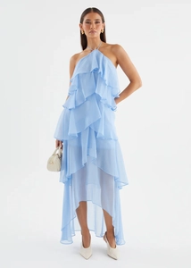 Close-up of layered sky blue chiffon ruffles on a halter neck beach dress