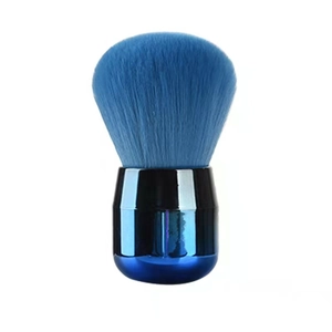 Single large blue mushroom-head powder brush with metallic handle on white background