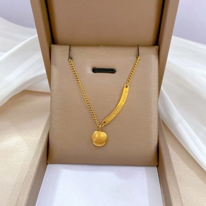 Gold smile pendant necklace with engraved bar on Cuba chain in jewelry box