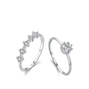 Elegant S925 sterling silver ring set featuring a classic six-prong solitaire and a five-stone band