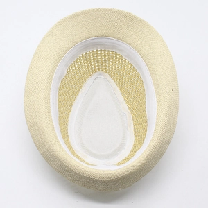 Detail view of woven straw sun hat interior showing sweatband and breathable lining