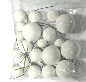 Mixed sizes of white foam balls with green wire stems for cake decoration and crafts