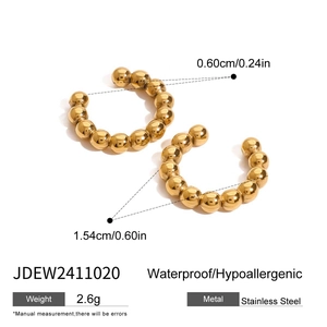 Gold stainless steel clip-on ear cuff with beaded texture and sizing specifications