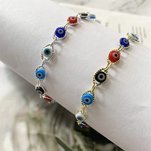 Turkish Evil Eye bracelet in gold and silver finish with multicolor enamel beads display