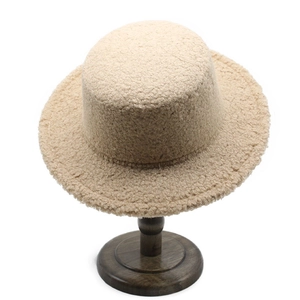 Retro flat top lamb wool hat in beige, warm felt winter fedora on wooden stand