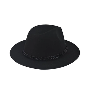 Close-up of a black flat top wool felt fedora featuring a bold black chain decoration