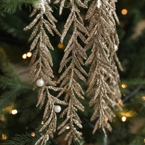 Rami di cipresso glitter champagne con perle bianche per decorare l'albero di Natale