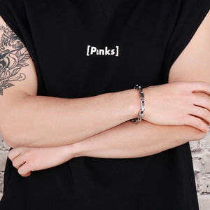 Close-up of vintage punk style stainless steel snake bone chain bracelet for men