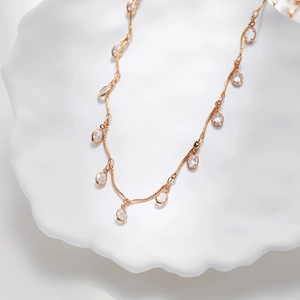 Minimalist 18K gold plated wave chain necklace with elegant oval zircon pendants