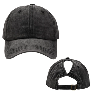 Detail of washed cotton baseball cap featuring a functional ponytail hole and metal buckle