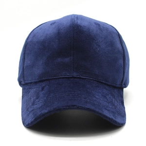 Detailed close-up of dark blue velvet baseball cap with soft suede texture and plain finish