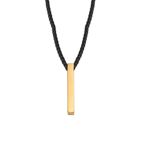 Detail of a polished gold vertical bar pendant on a black braided leather cord necklace