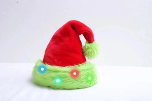 Detail of red Christmas hat with neon green plush trim and glowing colorful LED lights