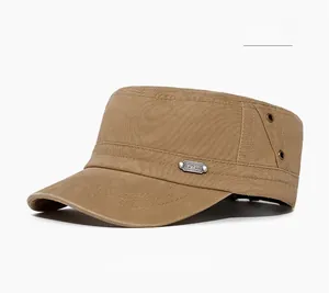 Close-up of khaki washed flat top cap with metal logo plate and breathable eyelets