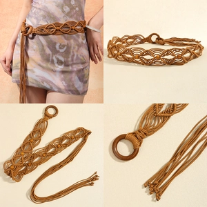 Close-up of woven belt details featuring round wooden buckle, beads, and tassels