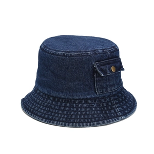 Dark blue washed denim bucket hat with side pocket and vintage metal button details