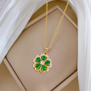 Elegant gold titanium steel necklace with green clover pendant and small diamonds