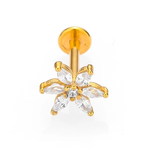 Detailed macro view of 316L stainless steel gold flower labret with white zircon stones