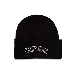 Close-up of California white embroidery on a black knitted winter beanie hat