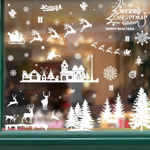 White Christmas window decals with Santa Claus, reindeer, and snowflakes silhouettes