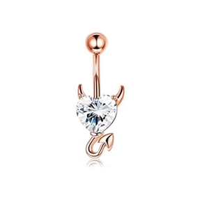 Detail of rose gold devil heart belly ring with clear cubic zirconia and horn accents