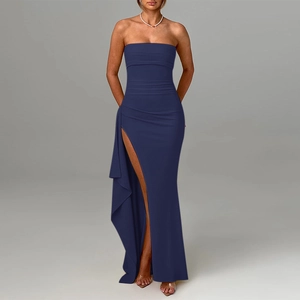 Detail of high side slit with ruffle hem on deep blue bodycon strapless knit dress