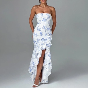 Detail of blue and white floral strapless dress with asymmetric ruffled hemline