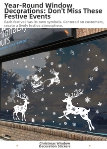 White Christmas window decals featuring Santa, reindeer, and snowflakes on a shopfront glass