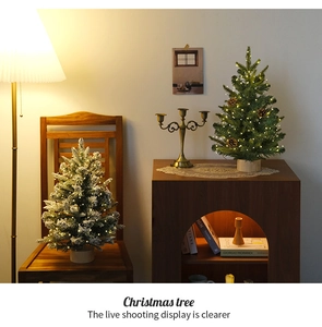 Mini desktop Christmas trees with warm LED lights and pinecones for cozy winter home decor