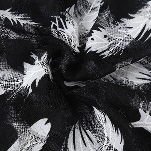 Breathable black lace beanie with white leaf pattern and textured mesh for women