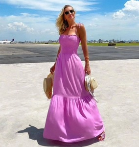 Detail of purple high waist maxi dress with smocked bodice and tiered flowy skirt