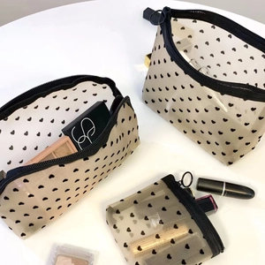 Three-piece set of heart print mesh makeup bags with zippers for cosmetic storage