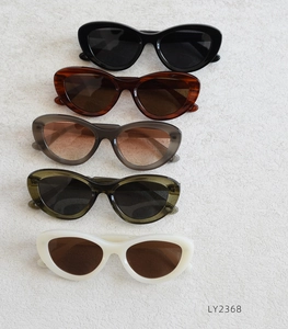 Detailed display of vintage cat-eye sunglasses in five color options with durable frames