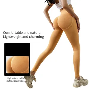 Seamless peach lift yoga leggings in bright orange with high waist compression design