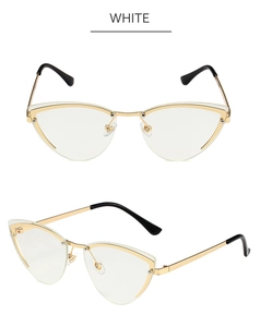 Detailed front and side view of gold metal cat-eye sunglasses with white temple accents