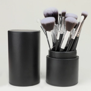 Coffret de 15 pinceaux de maquillage avec poils synthétiques et étui cylindre en cuir